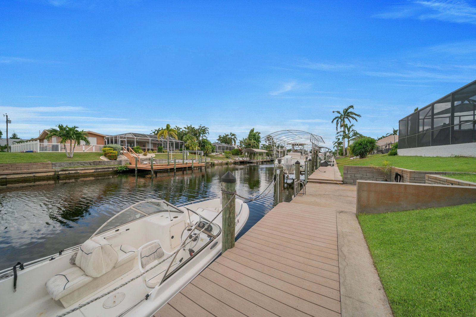 A dock and boat on a Cape Coral canal