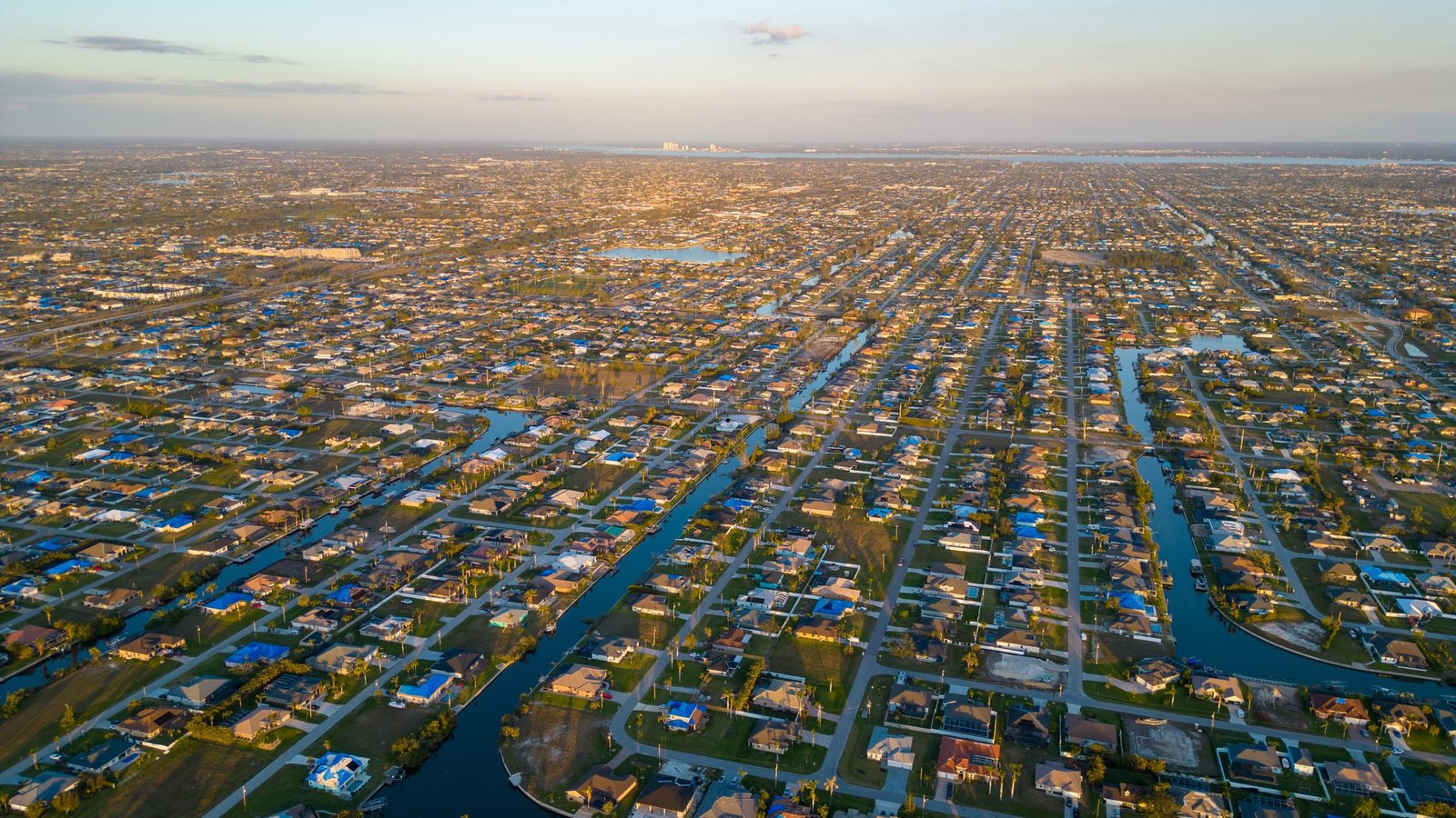 Aerial view of Cape Coral neighborhoods at golden hour